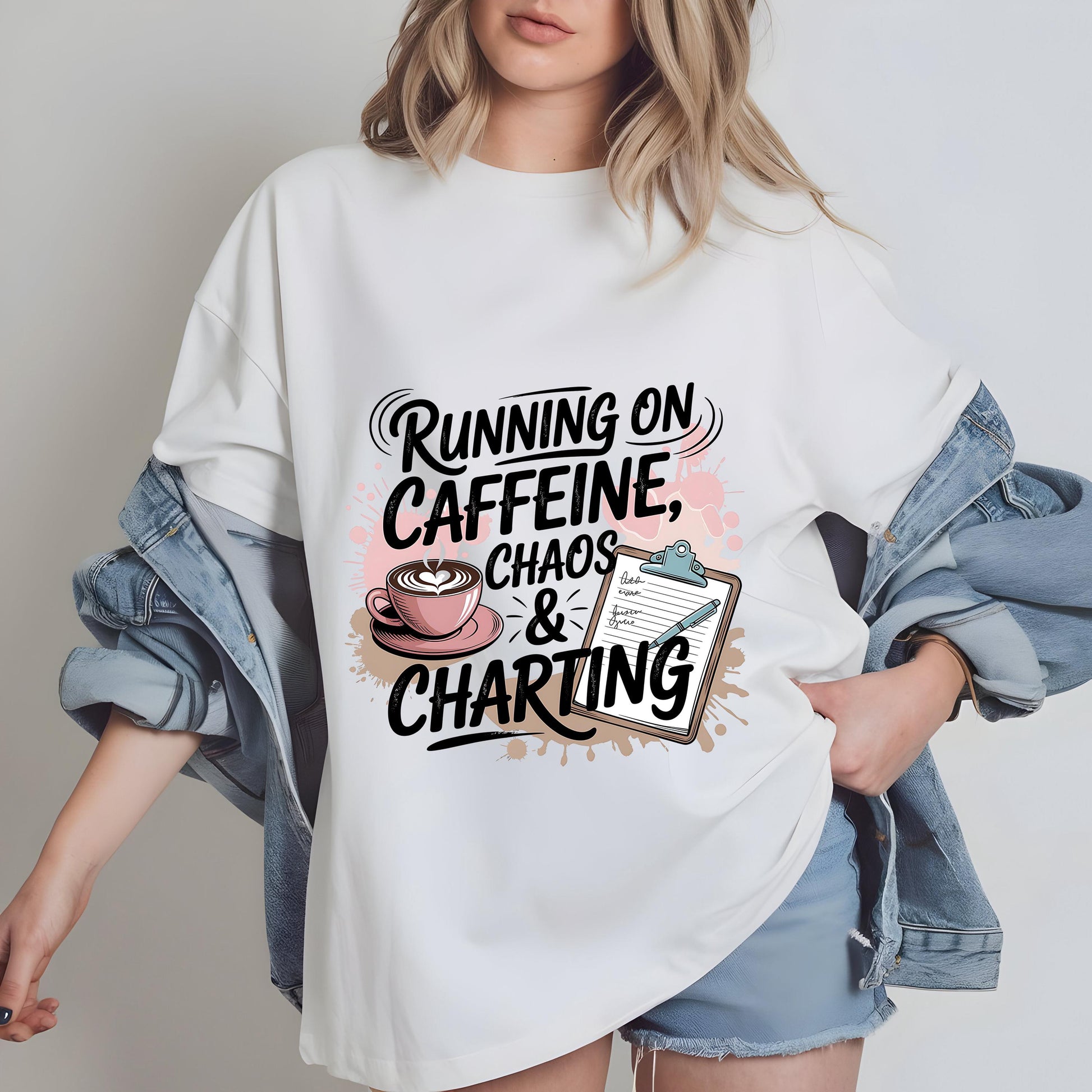 A woman wearing a white t-shirt with a graphic design that says "Running on Caffeine, Chaos & Charting".