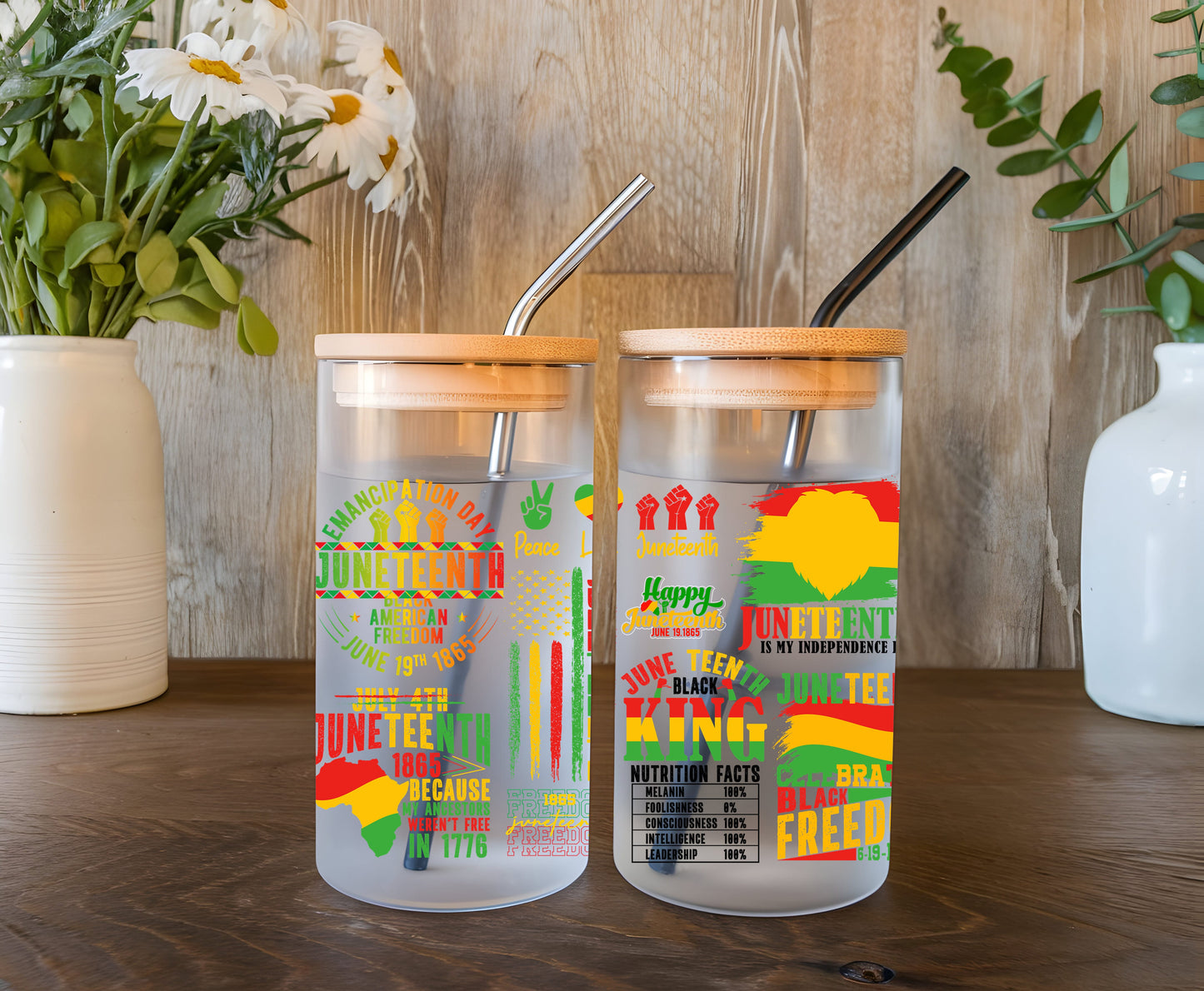 a couple of glass cups sitting on top of a wooden table