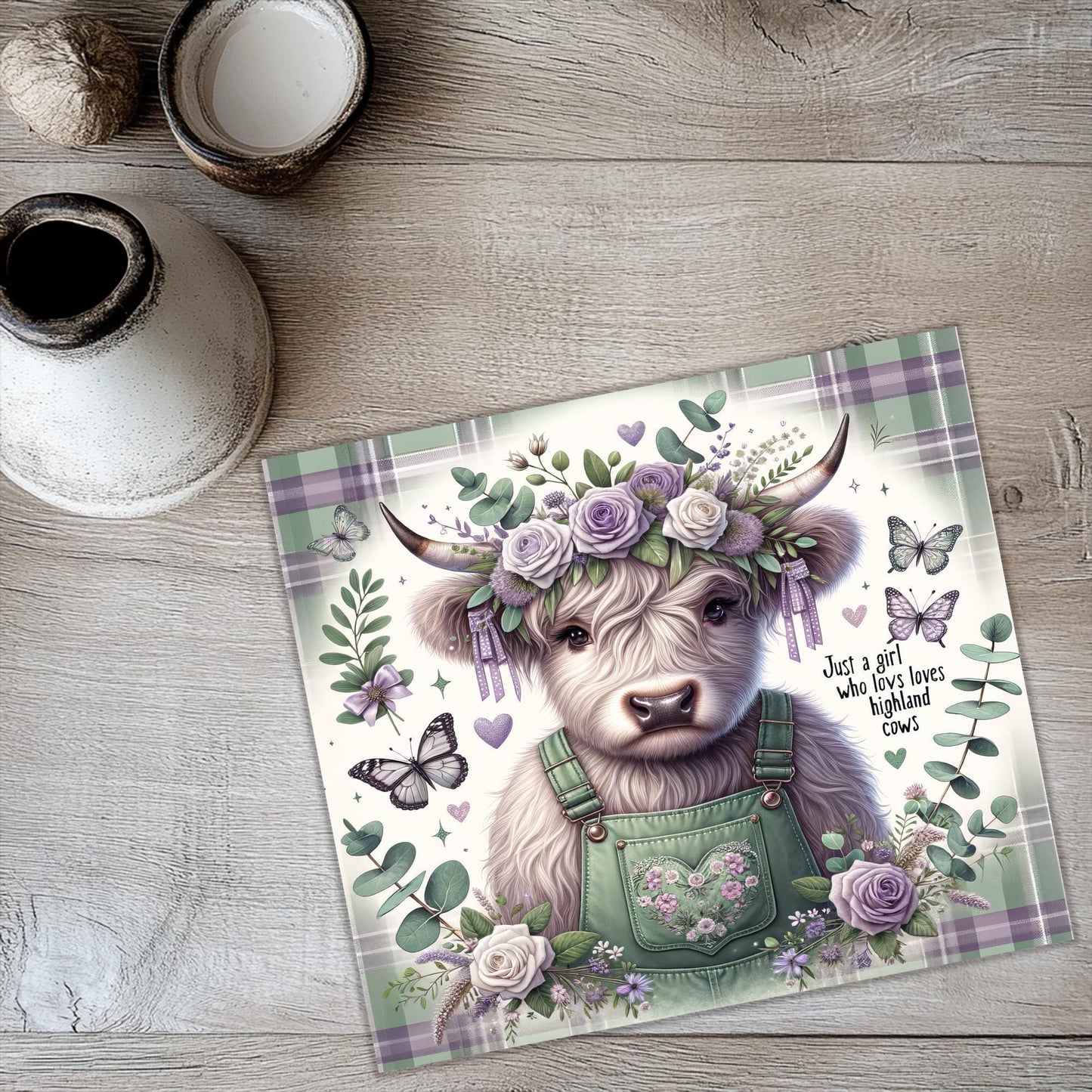 a card with a picture of a cow wearing a flower crown
