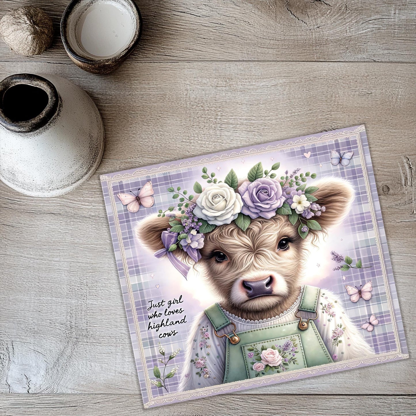 a card with a picture of a cow wearing a flower crown