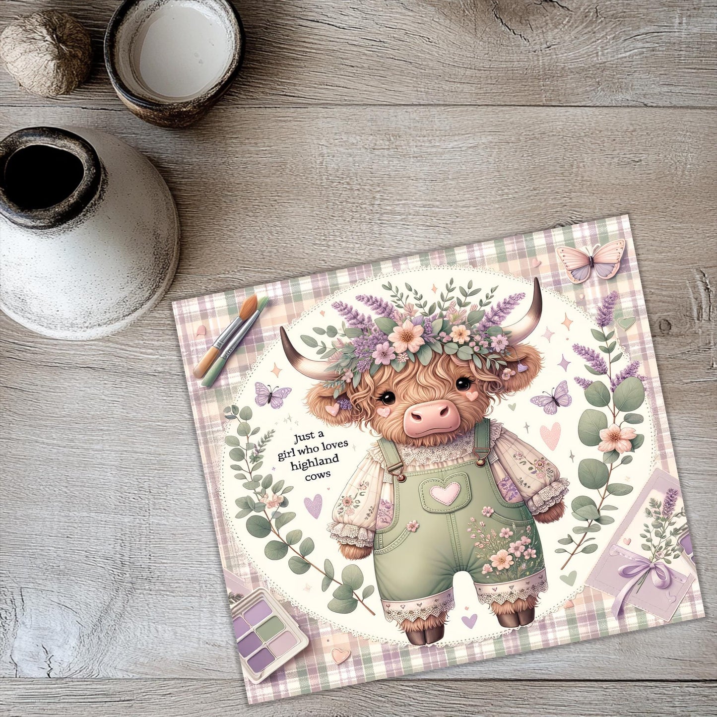 a card with a picture of a cow wearing a flower crown
