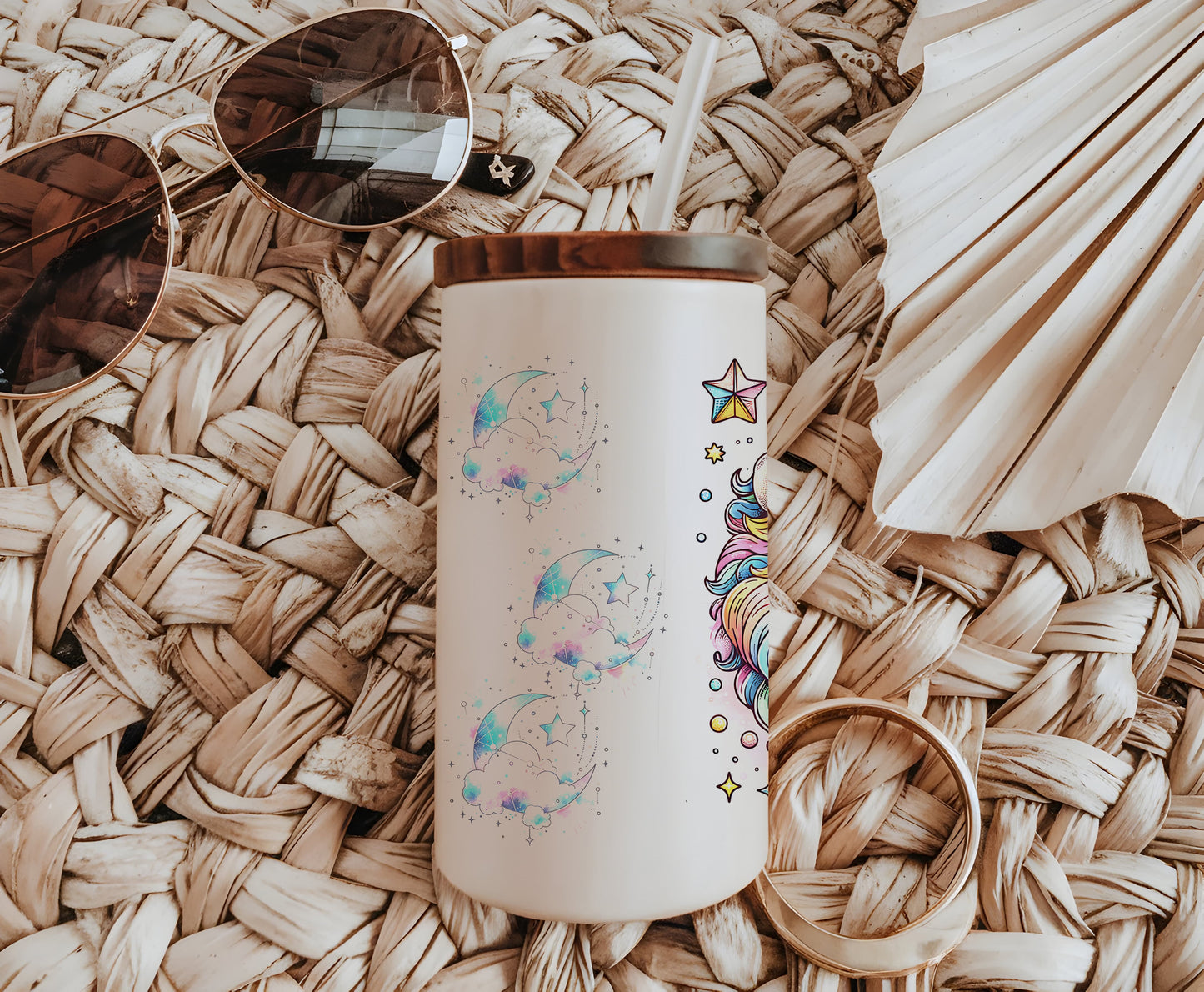 a white coffee cup sitting on top of a wicker table
