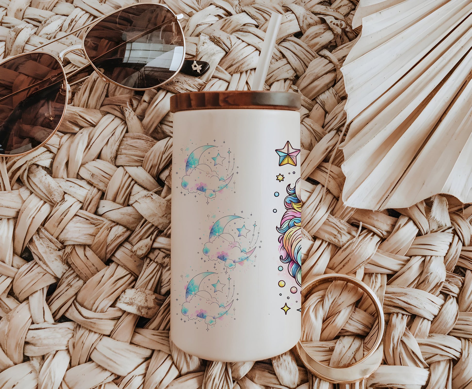 a white coffee cup sitting on top of a wicker table