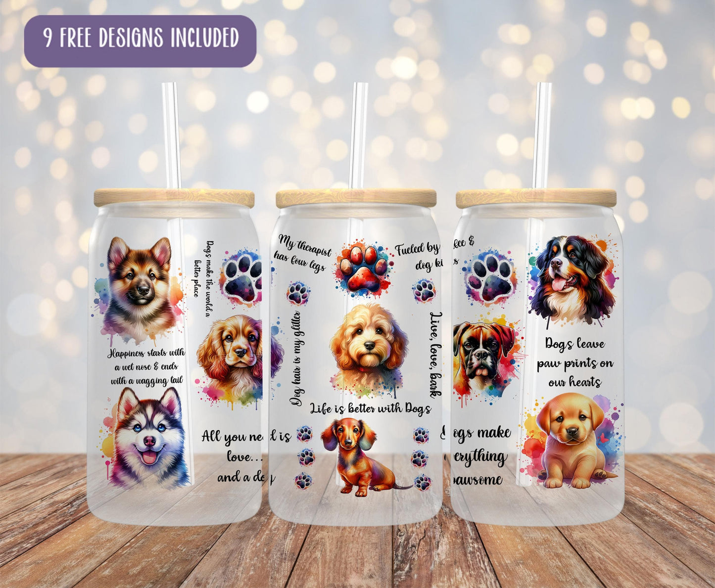 a set of three dog themed tumblers on a wooden table