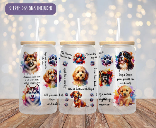a set of three dog themed tumblers on a wooden table