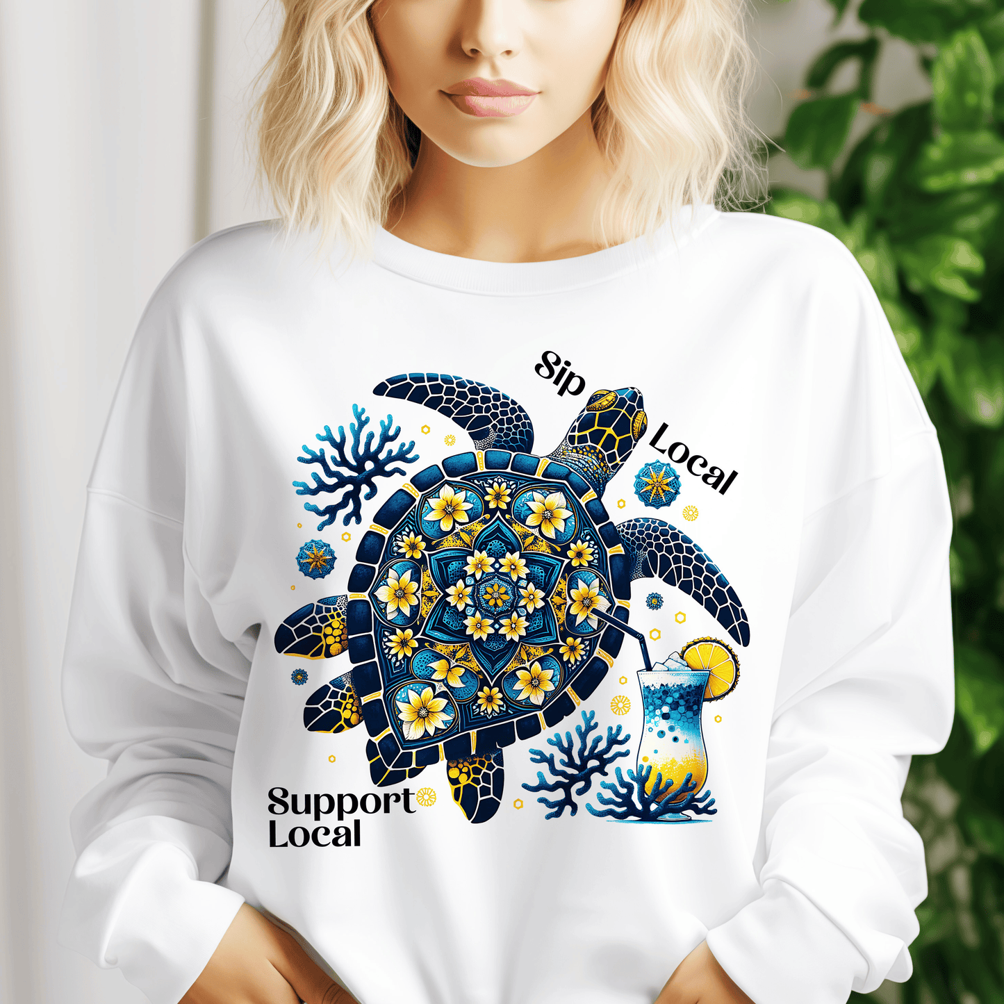 a woman wearing a white shirt with a turtle on it