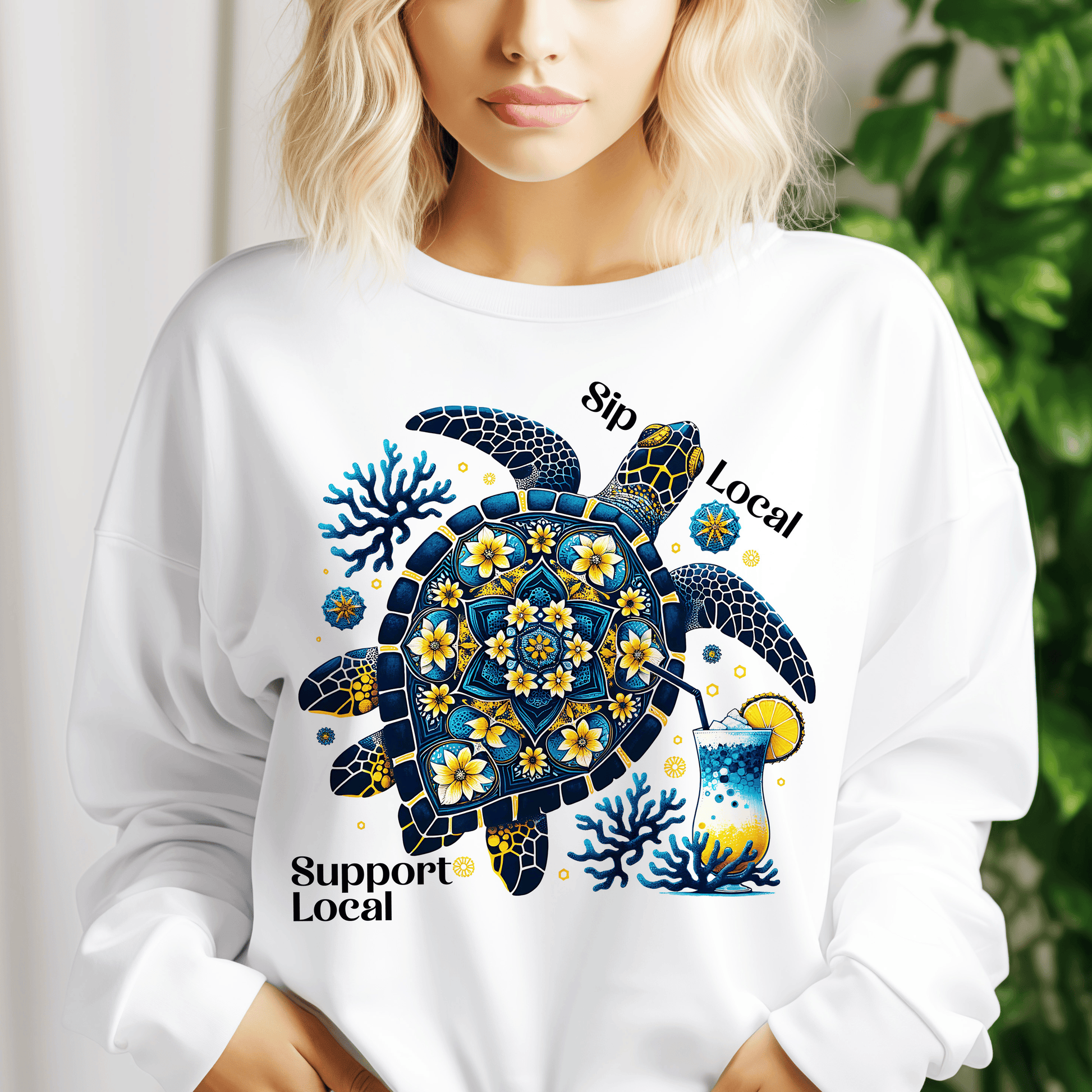 a woman wearing a white shirt with a turtle on it