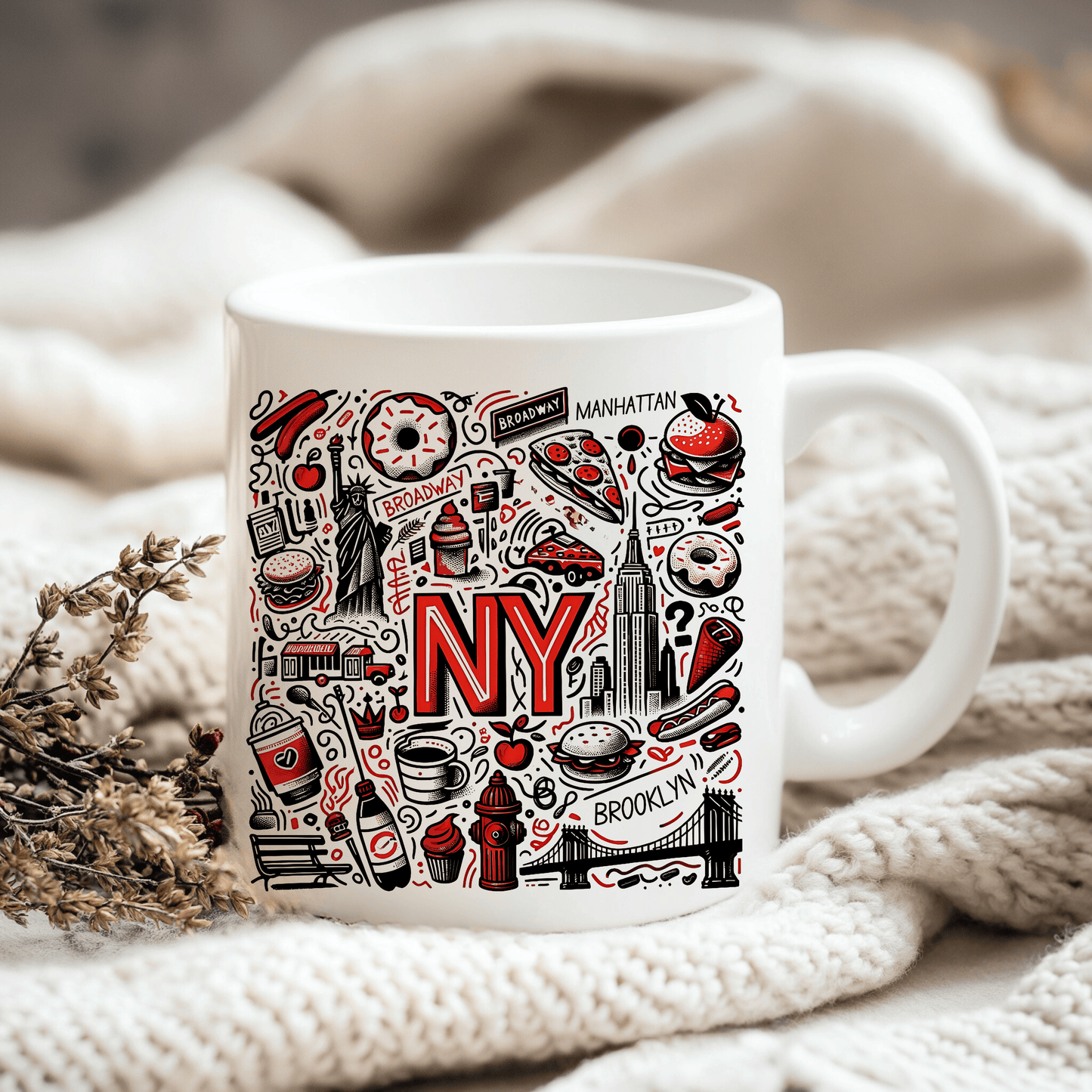 A white mug with a colorful design featuring various iconic New York City symbols and landmarks, such as the Statue of Liberty, the Empire State Building, and a hot dog.