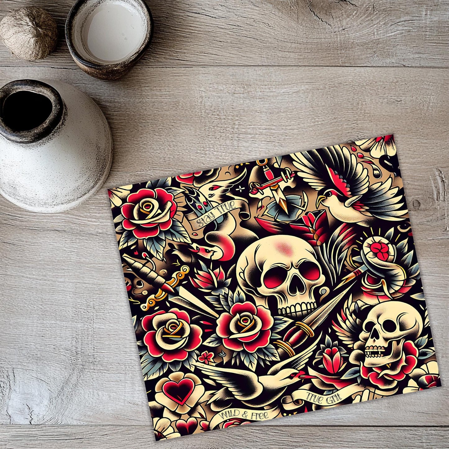a picture of a table with a skull and roses on it