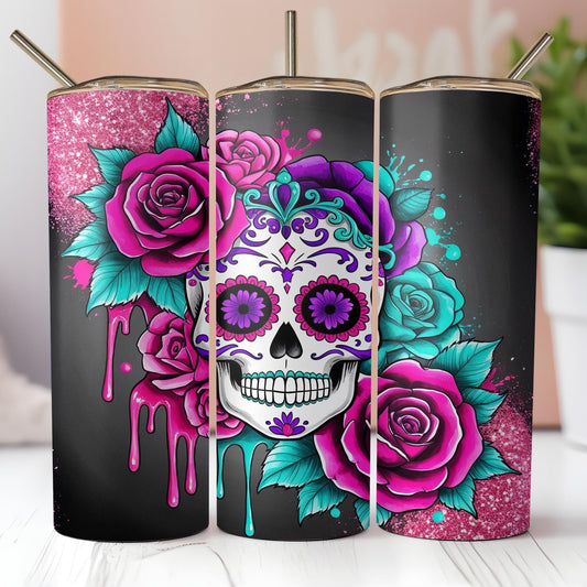 a group of three tumbles decorated with sugar skulls and roses