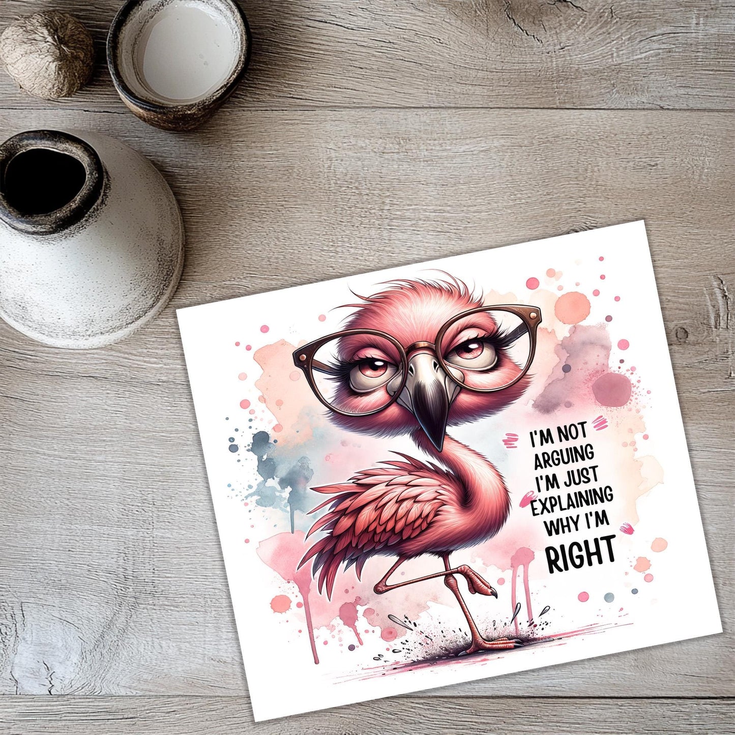 a card with a pink flamingo wearing glasses