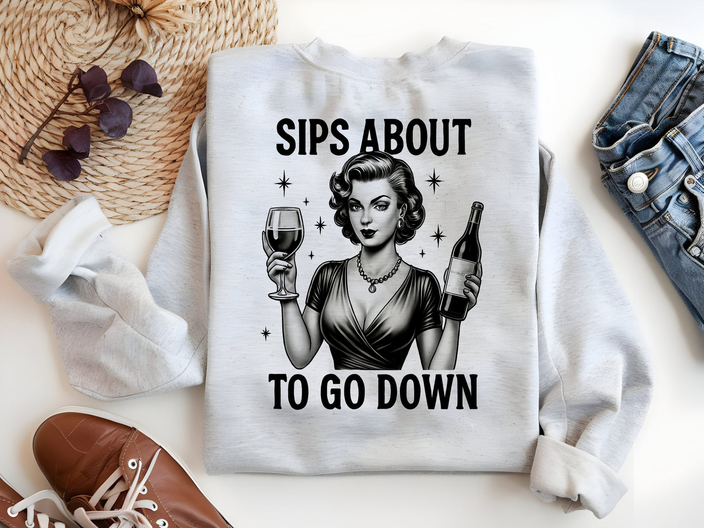 a sweater with a woman holding a glass of wine