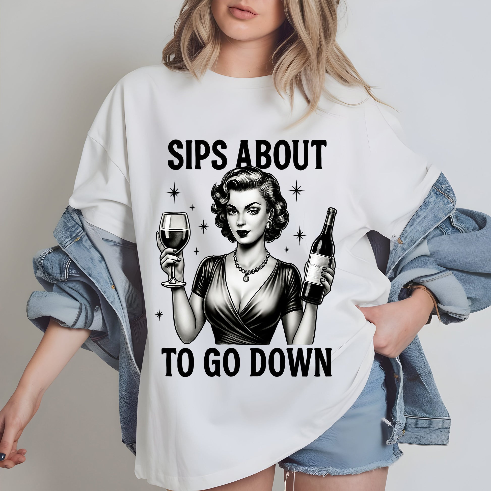 a woman wearing a t - shirt that says sips about to go down
