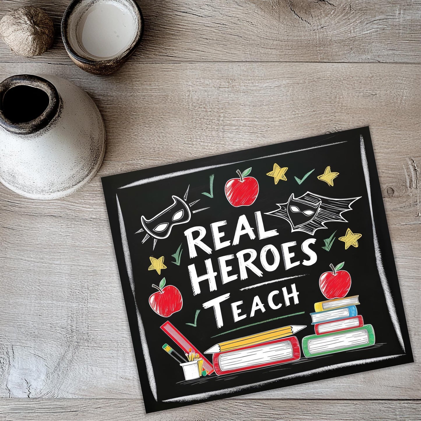 a sign that says real hero's teach on it