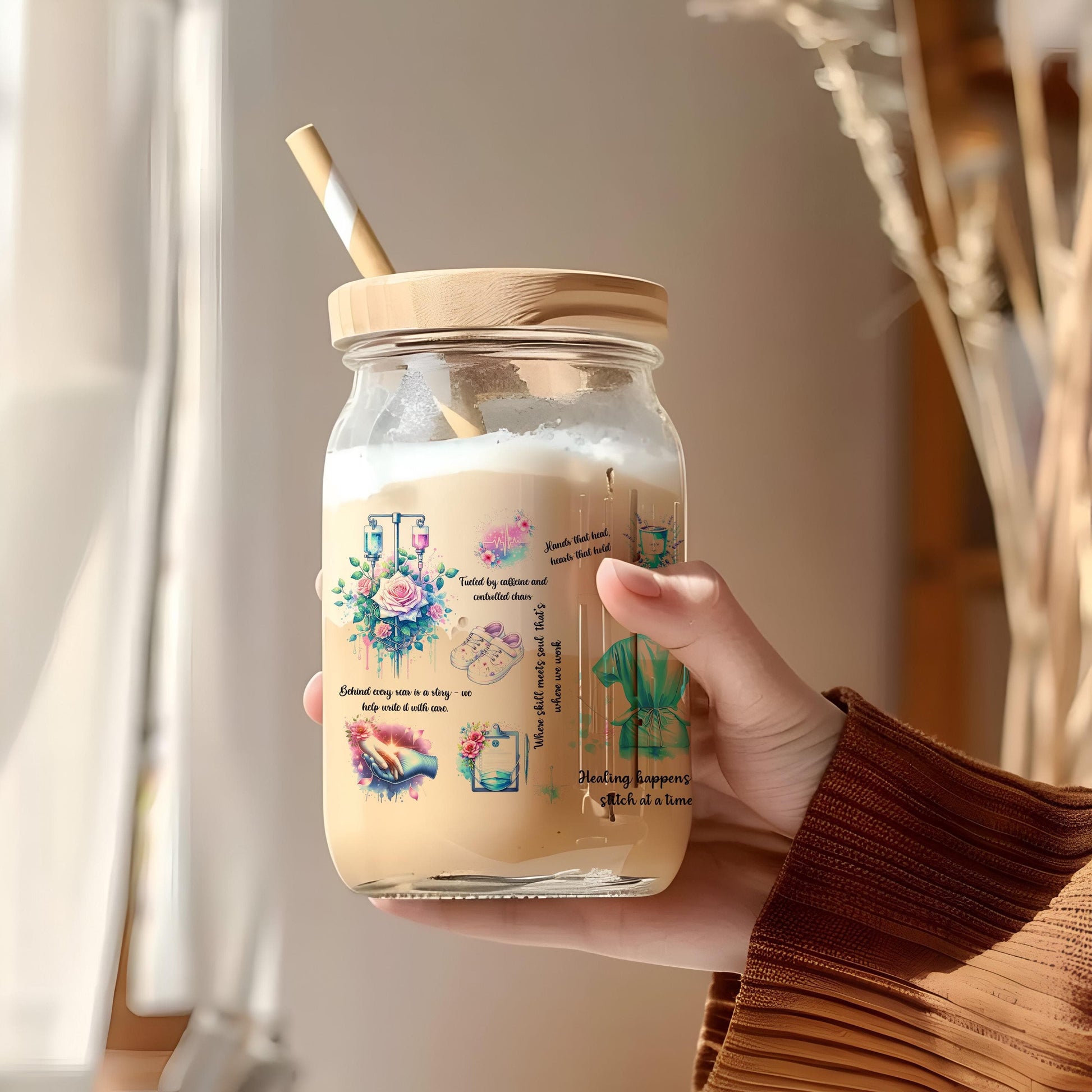 a person holding a jar with a straw in it