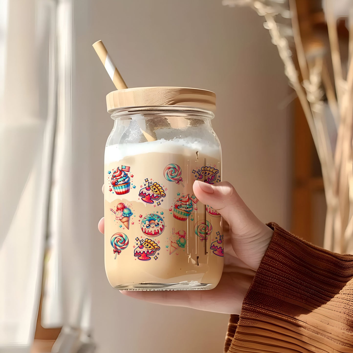 a person holding a jar with a straw in it