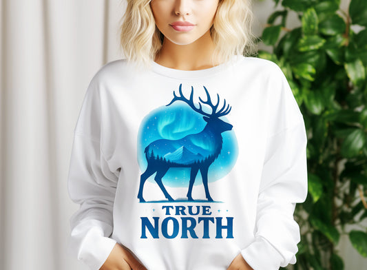 a woman wearing a white shirt with a deer graphic on it