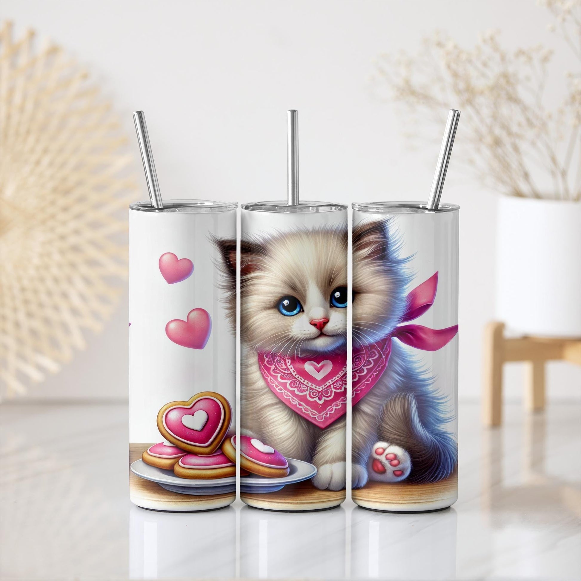 a couple of cups with a cat on them
