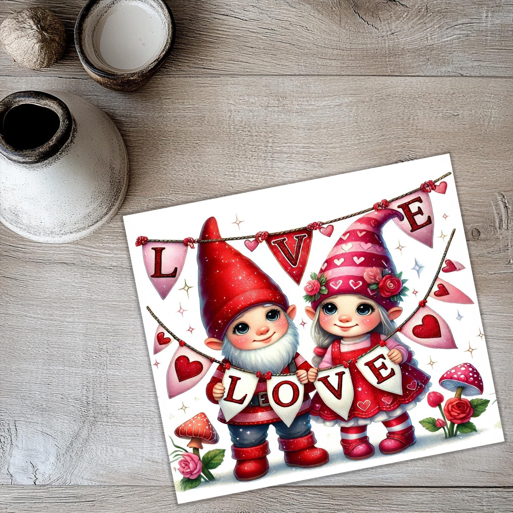 a card with two gnomes on it on a table